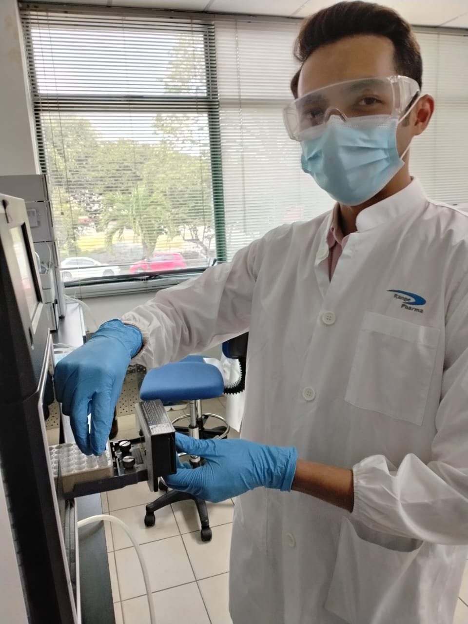 A researcher running a formulation trial in the R&D lab